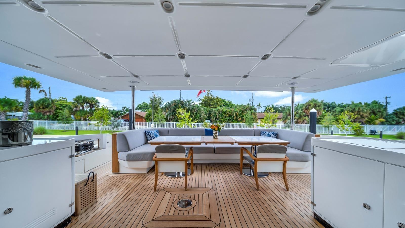 a large open kitchen and dining area aboard ONE & ONLY Yacht for Sale