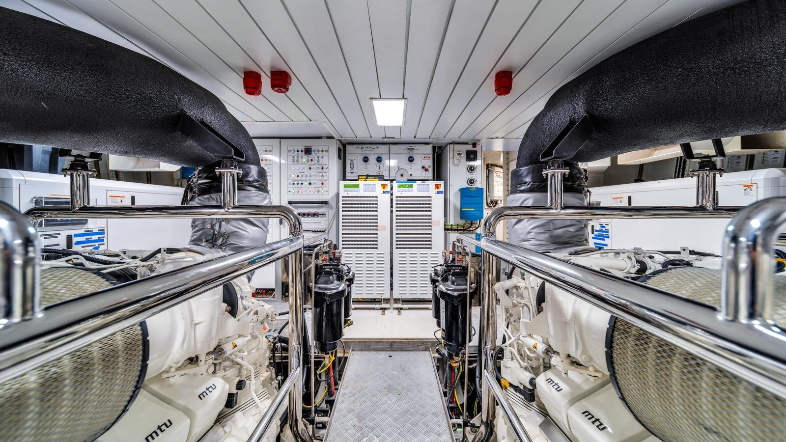 a room with several machines aboard ONE & ONLY Yacht for Sale