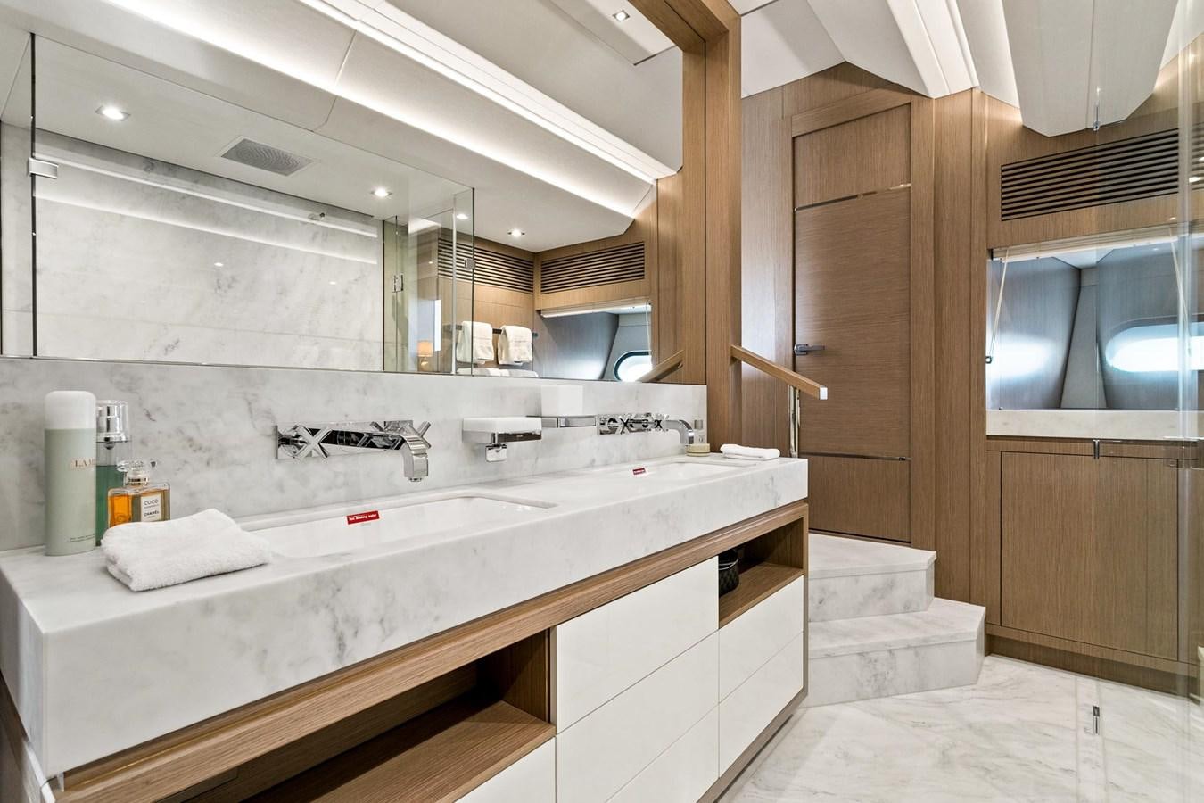 a bathroom with a large sink aboard POPS Yacht for Sale