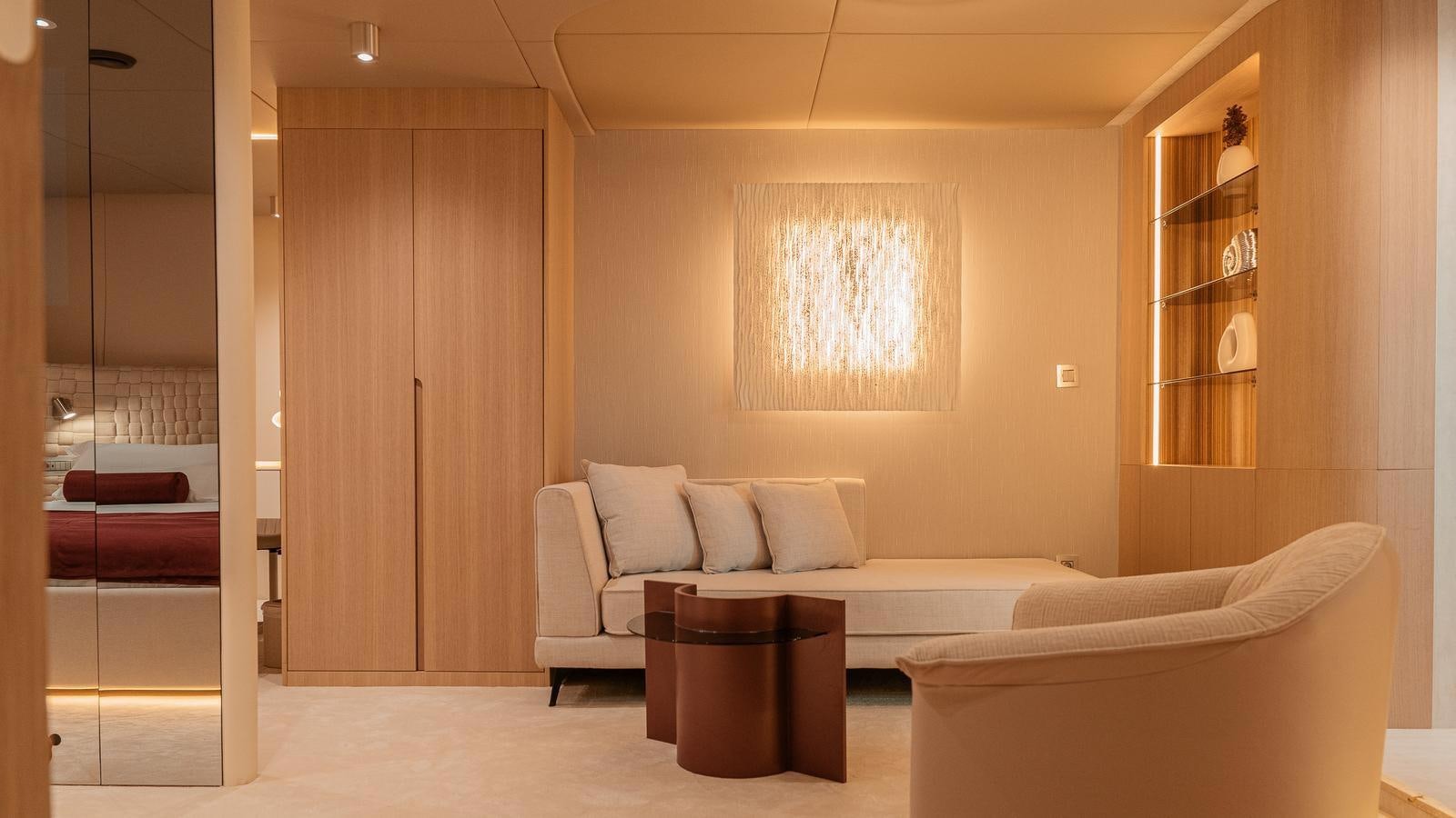 a room with a couch and a table aboard REPOSADO Yacht for Sale