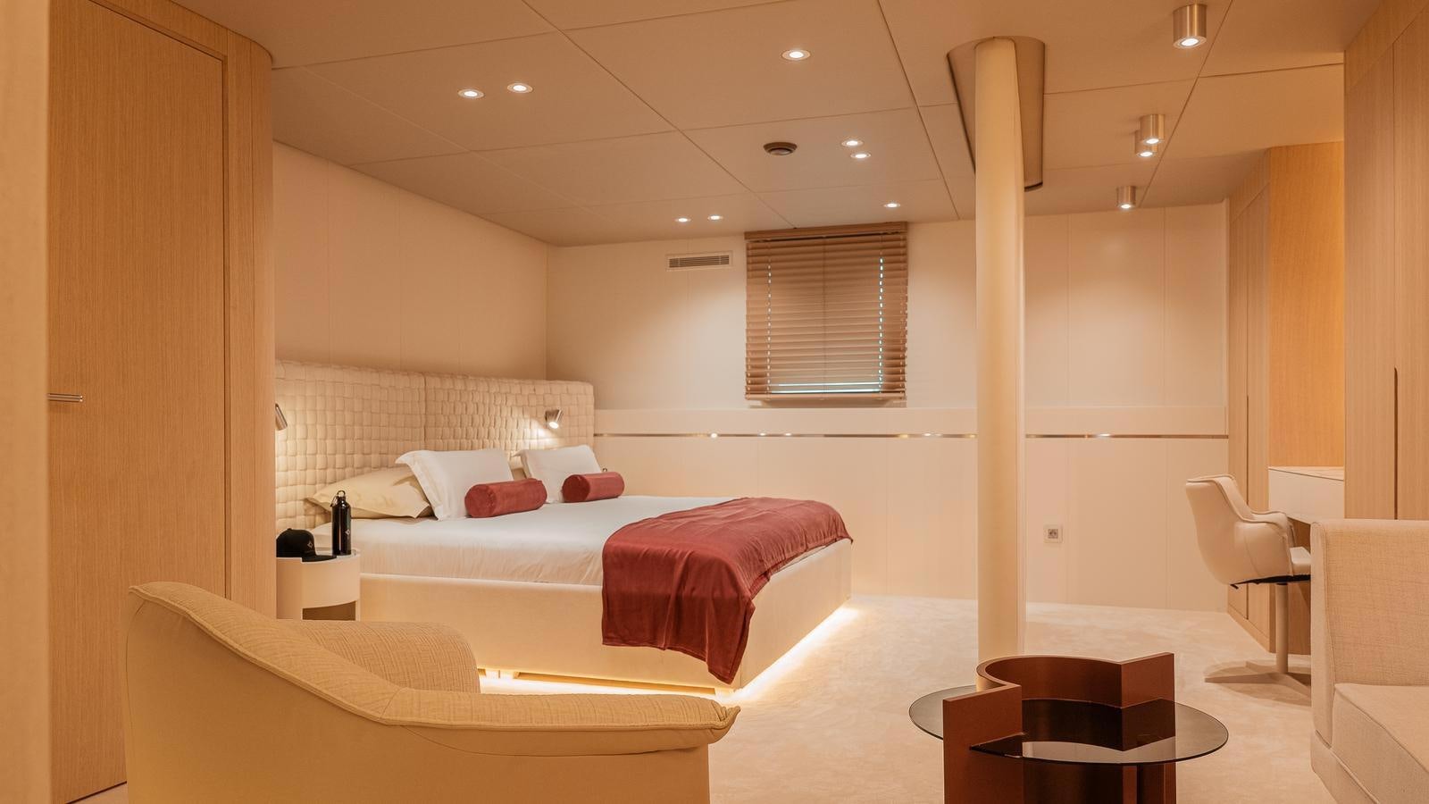 a room with a couple of beds aboard REPOSADO Yacht for Sale