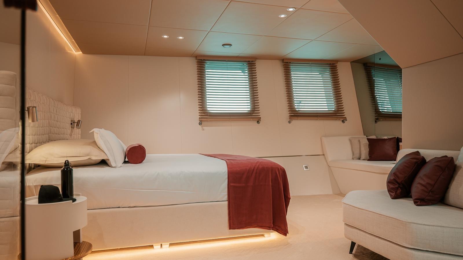 a room with two beds aboard REPOSADO Yacht for Sale