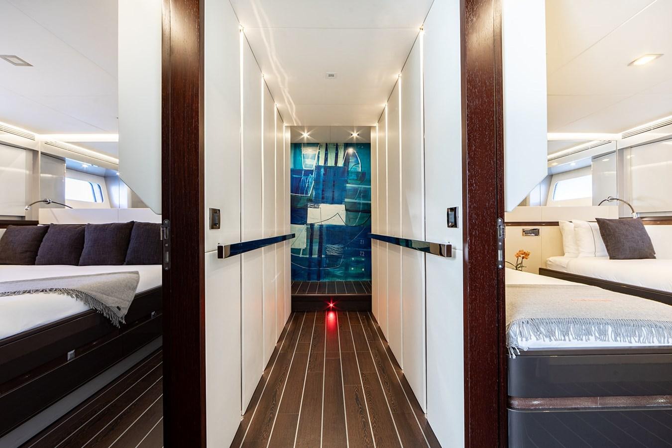 a room with a bed and a window aboard BLISS Yacht for Sale
