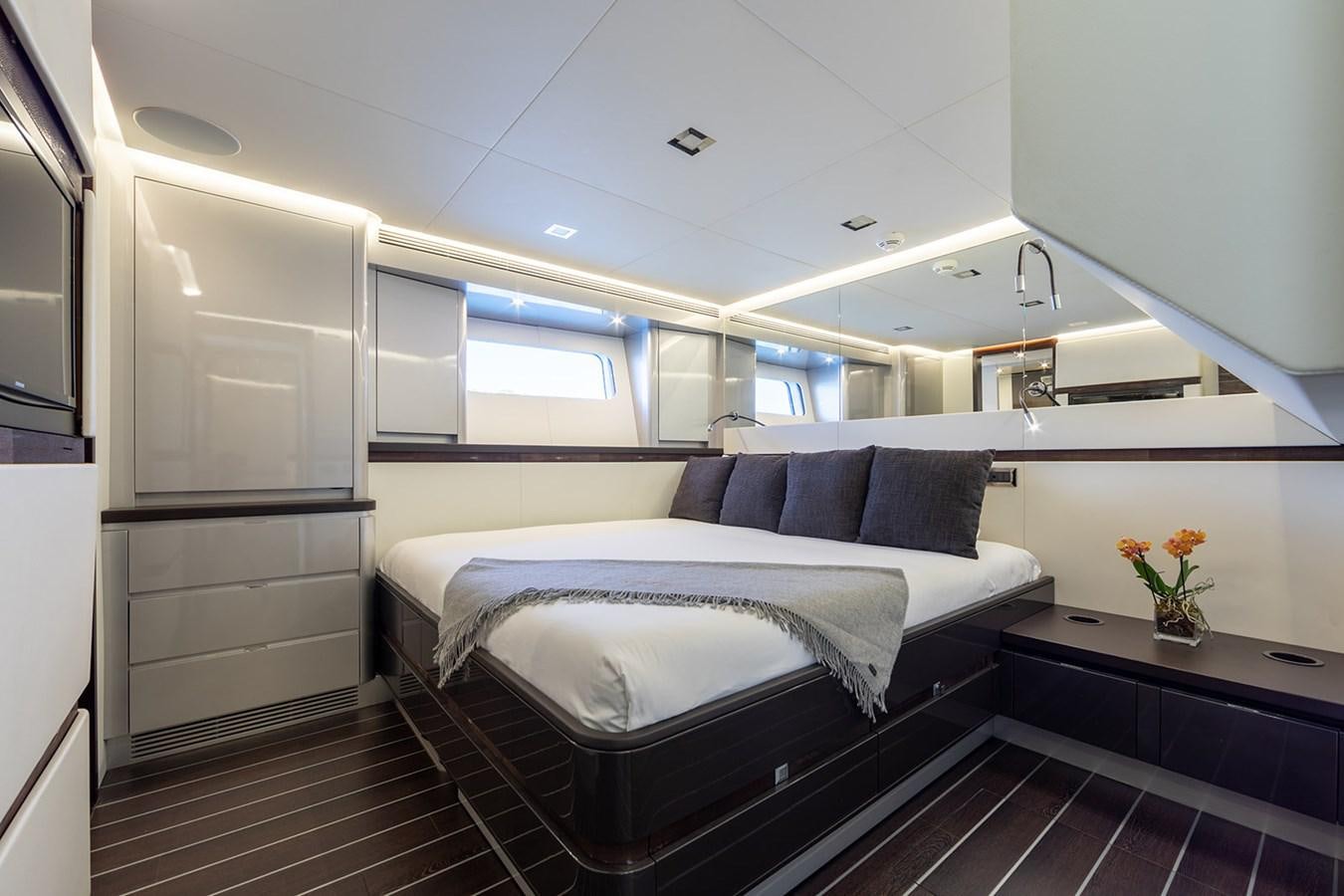 a bed in a room aboard BLISS Yacht for Sale