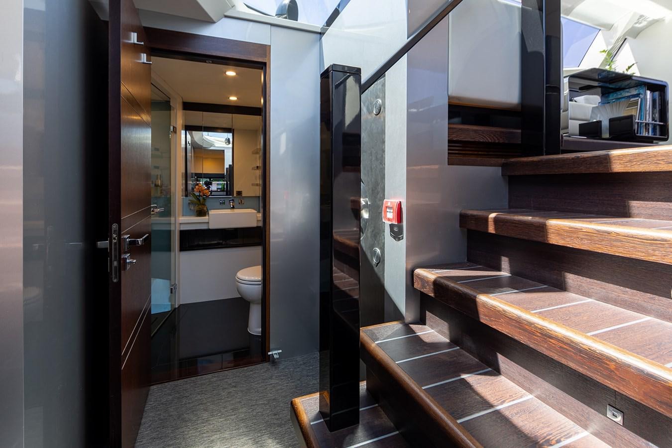 a bathroom with a large mirror aboard BLISS Yacht for Sale