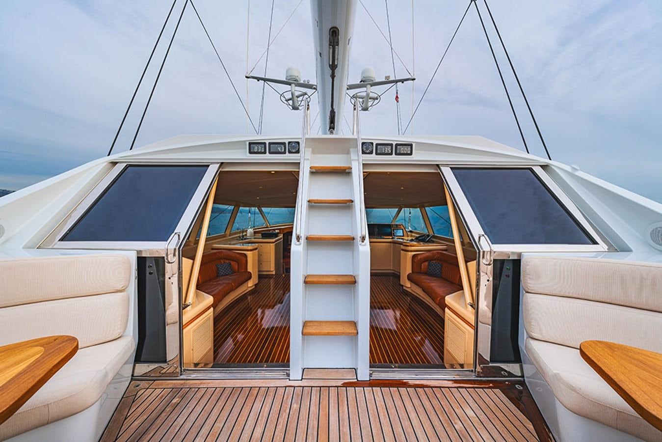 a boat with a ladder on the deck aboard ECLIPSE Yacht for Sale