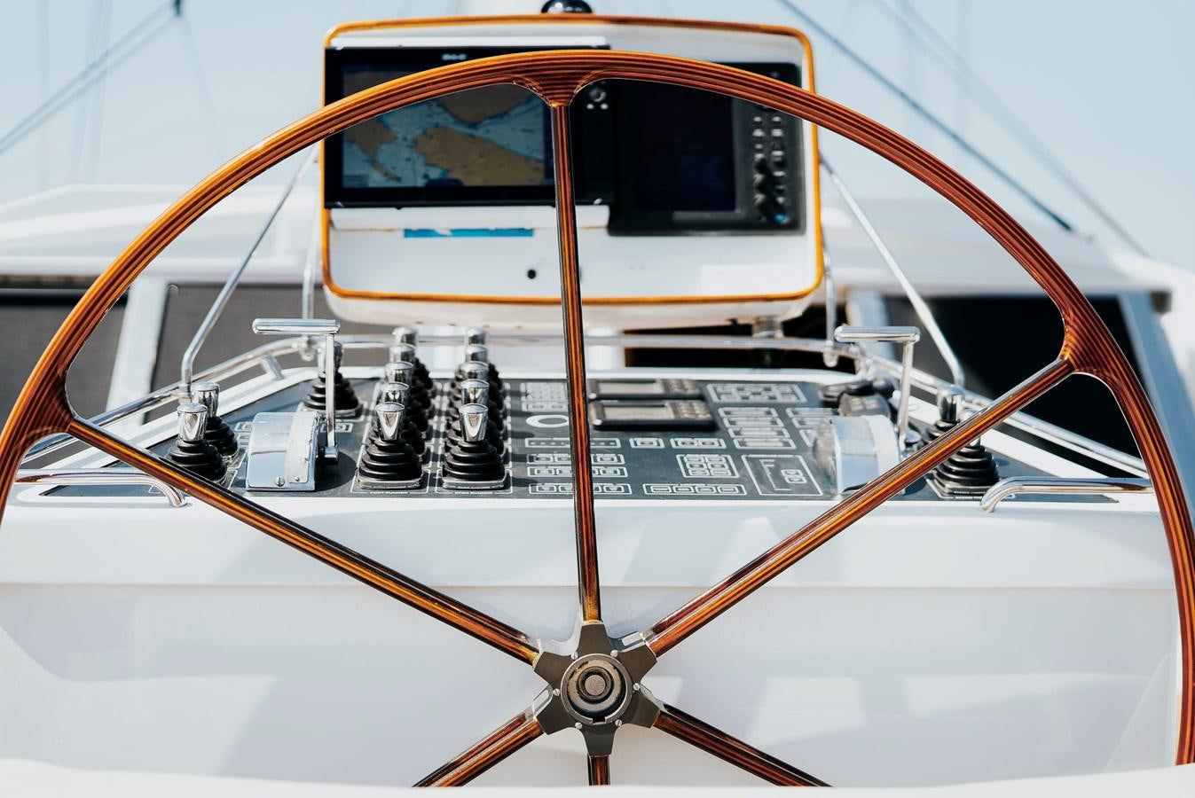 a close-up of a white and orange boat aboard ECLIPSE Yacht for Sale