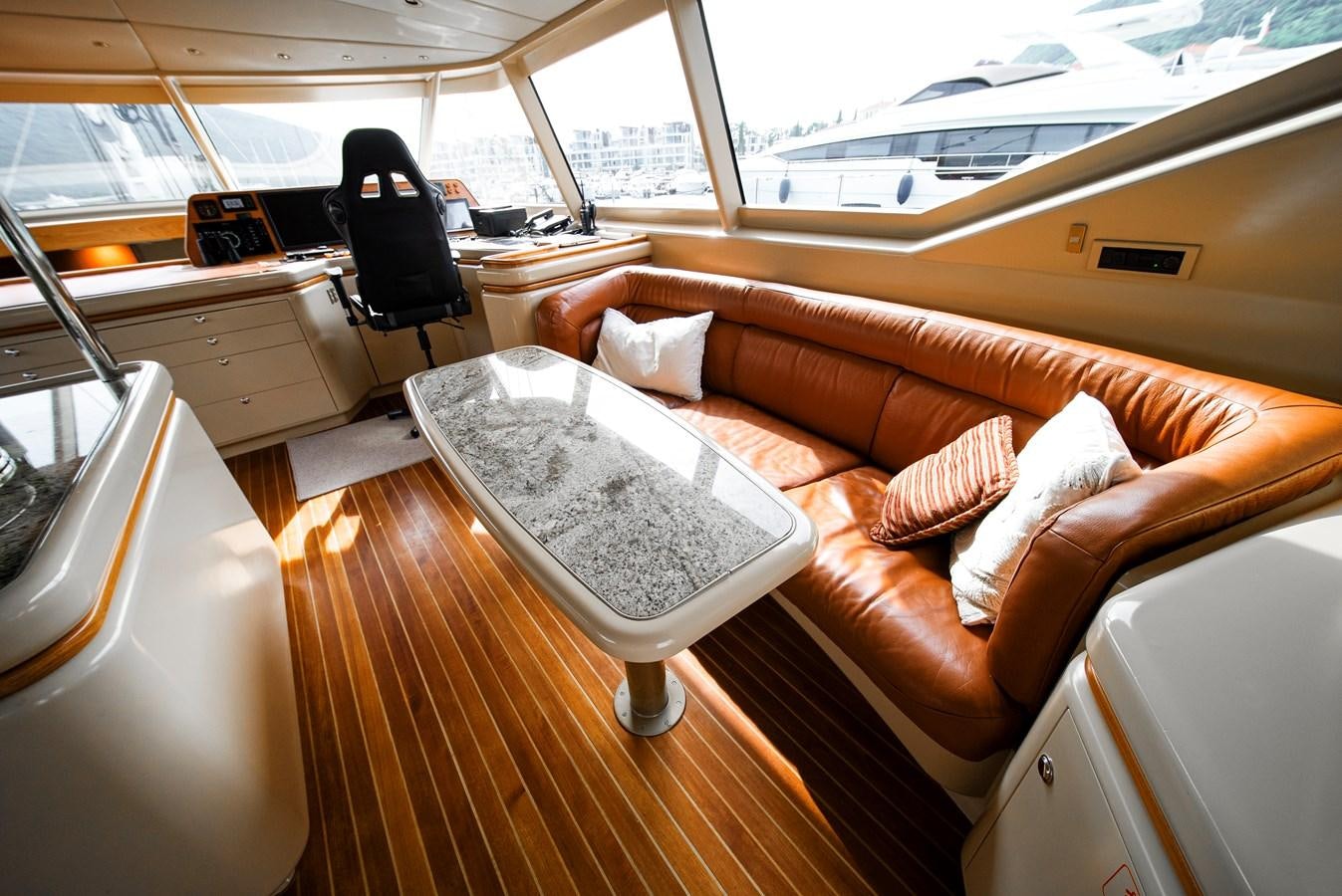 a boat with pillows and a chair aboard ECLIPSE Yacht for Sale
