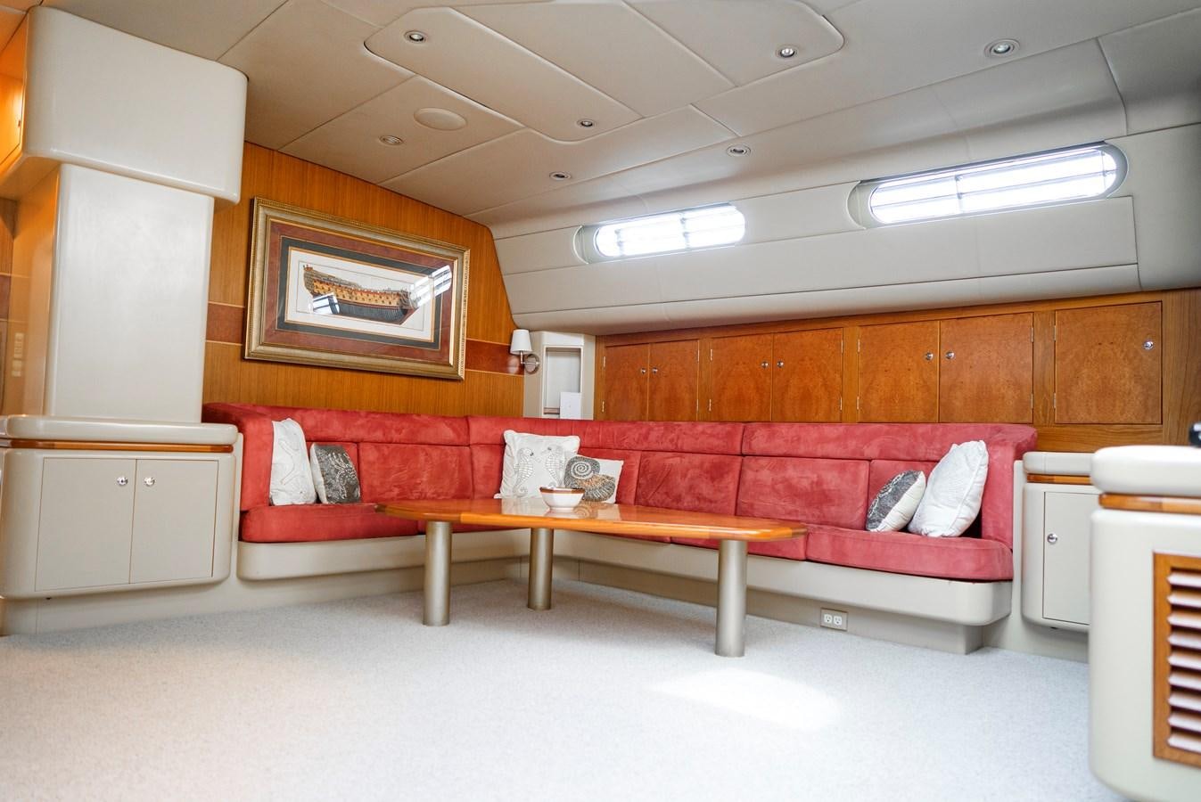 a room with a couch and a table aboard ECLIPSE Yacht for Sale