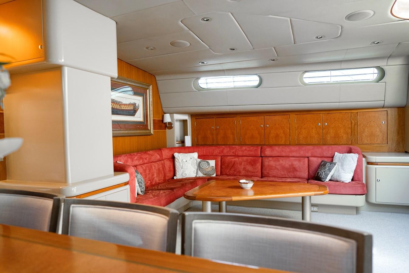 a room with a couch and a table aboard ECLIPSE Yacht for Sale