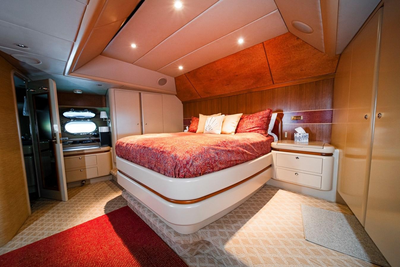a bed in a room aboard ECLIPSE Yacht for Sale