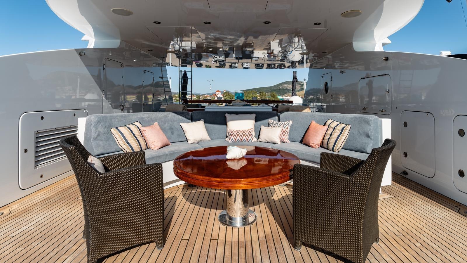 a room with a table and chairs aboard RARE FIND Yacht for Sale