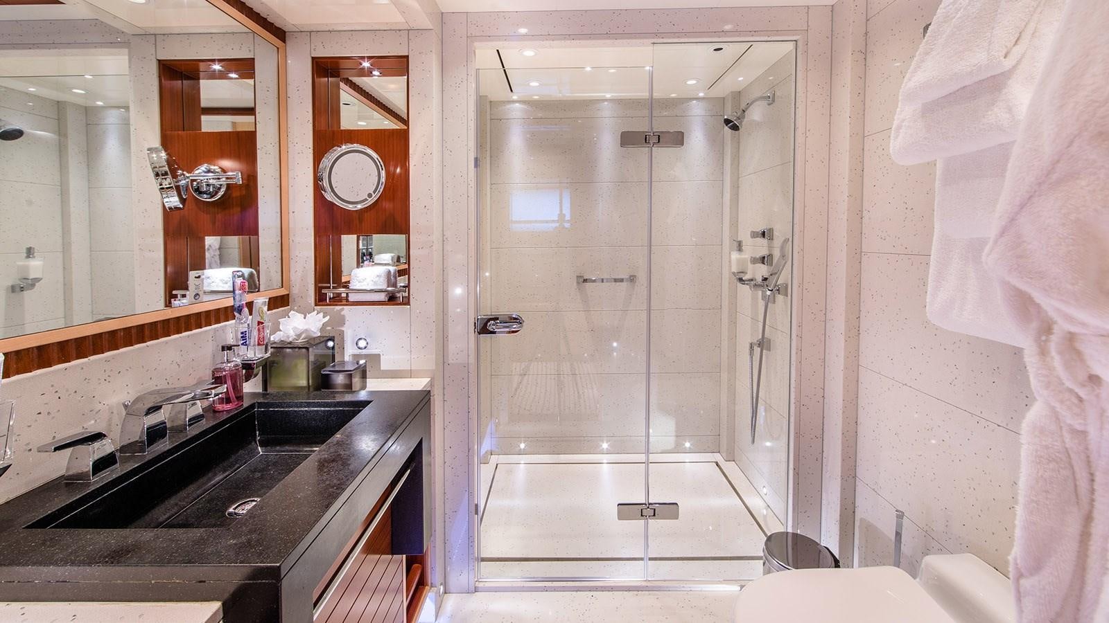 a bathroom with a shower aboard RARE FIND Yacht for Sale