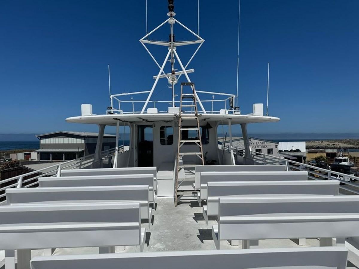 a boat on a dock aboard OCEAN THUNDER Yacht for Sale