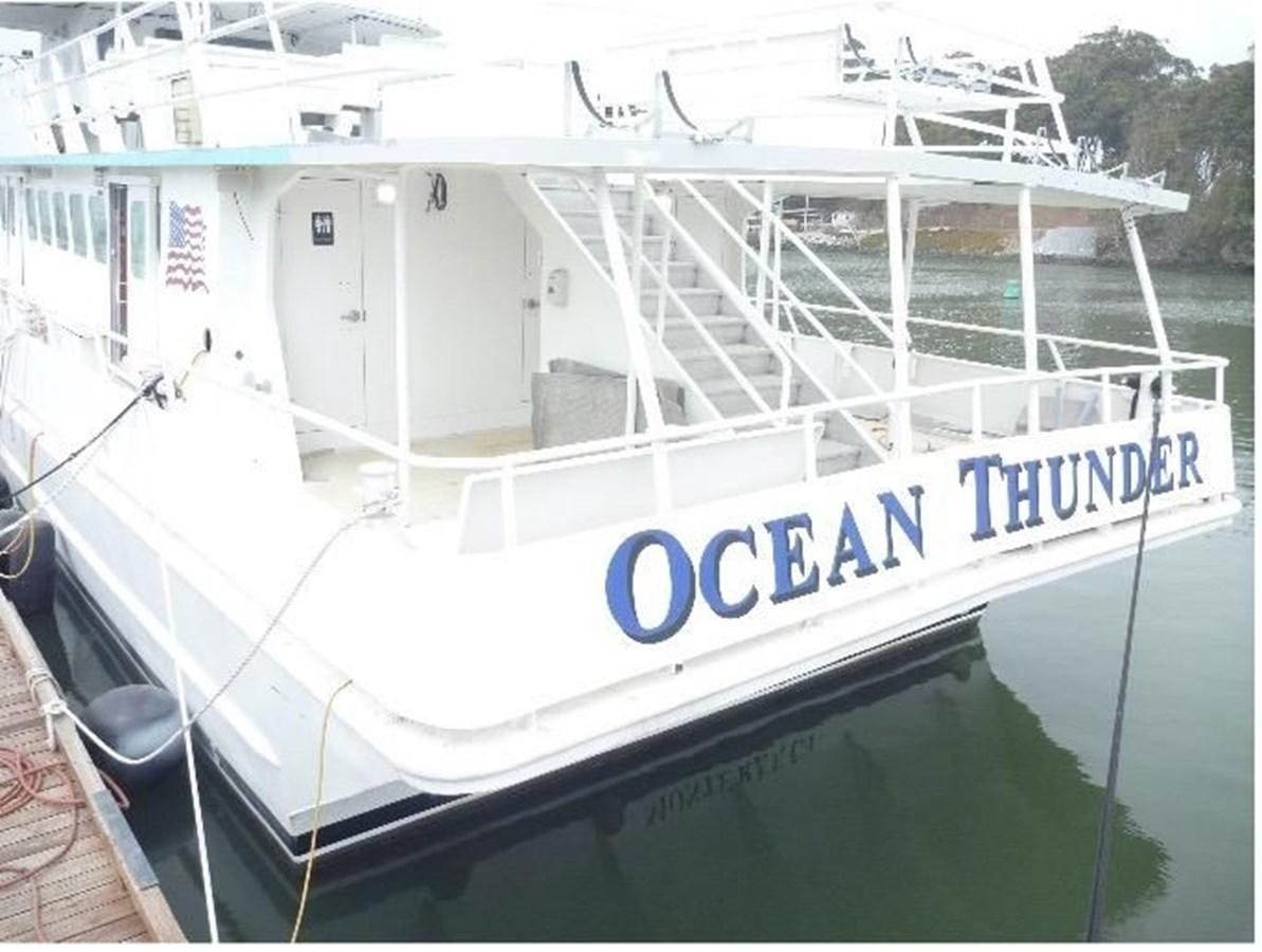 a large white boat aboard OCEAN THUNDER Yacht for Sale