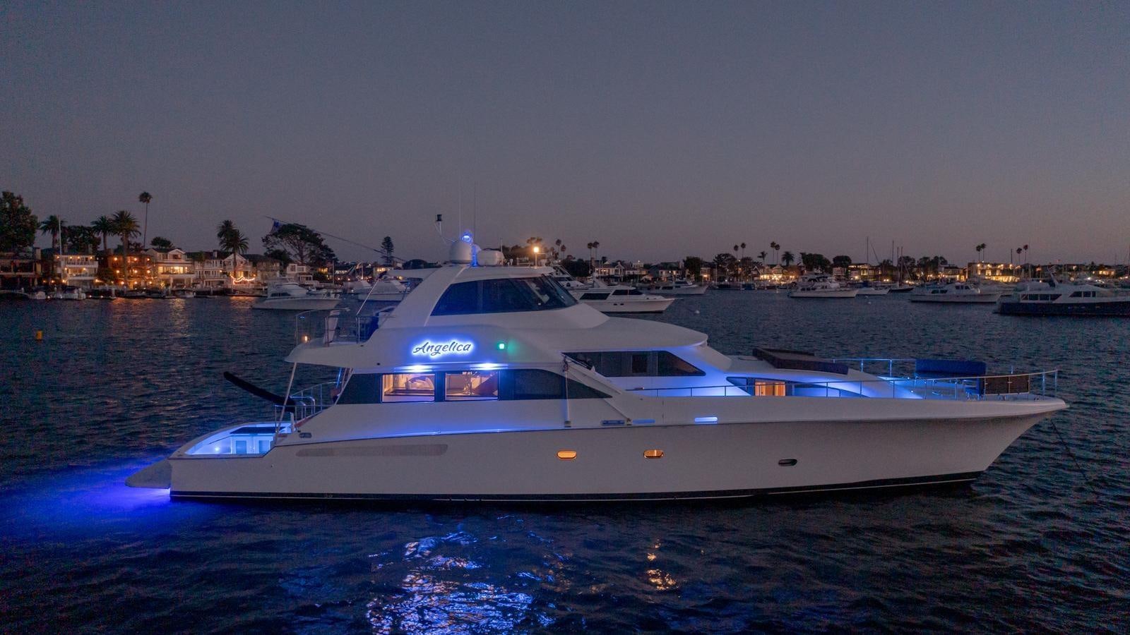 a white yacht on the water aboard ANGELICA Yacht for Sale