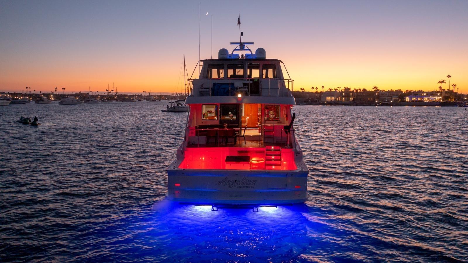 a red and white boat on water aboard ANGELICA Yacht for Sale