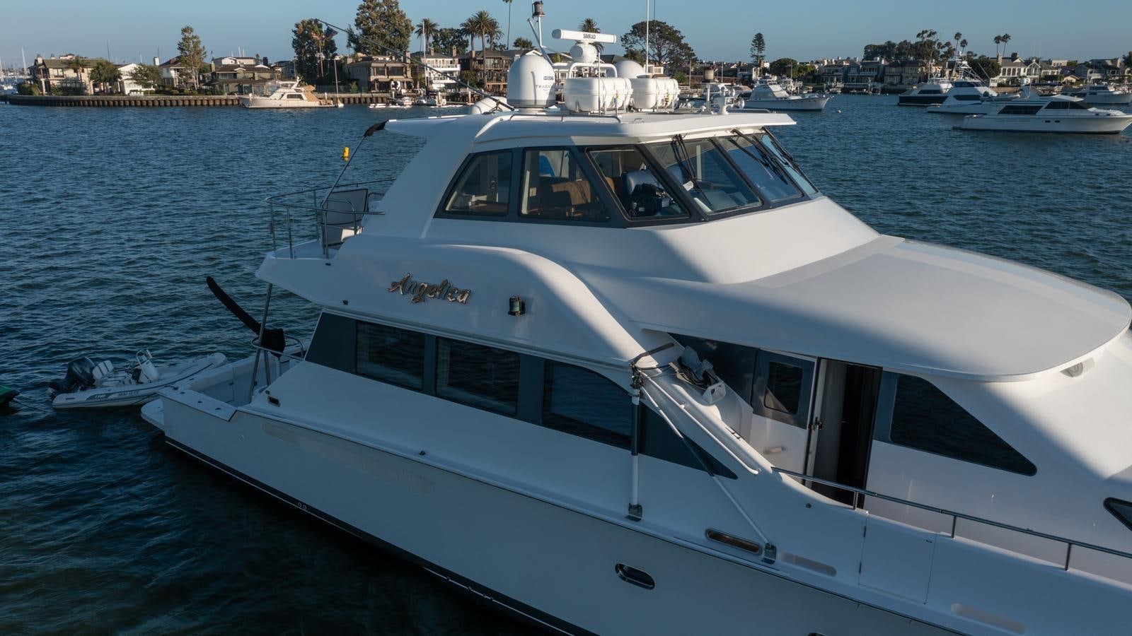a white yacht in the water aboard ANGELICA Yacht for Sale