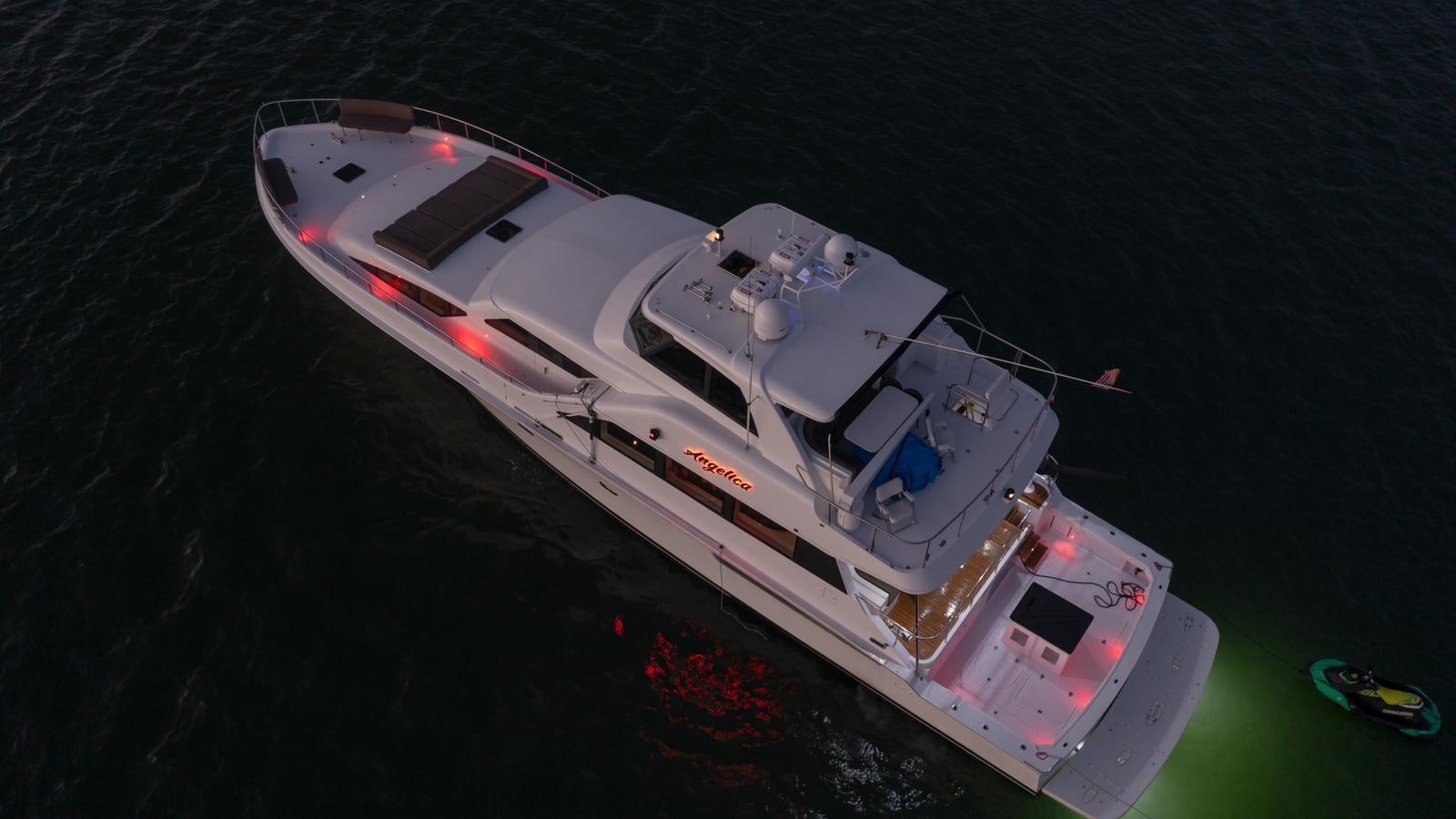 a white boat in the water aboard ANGELICA Yacht for Sale