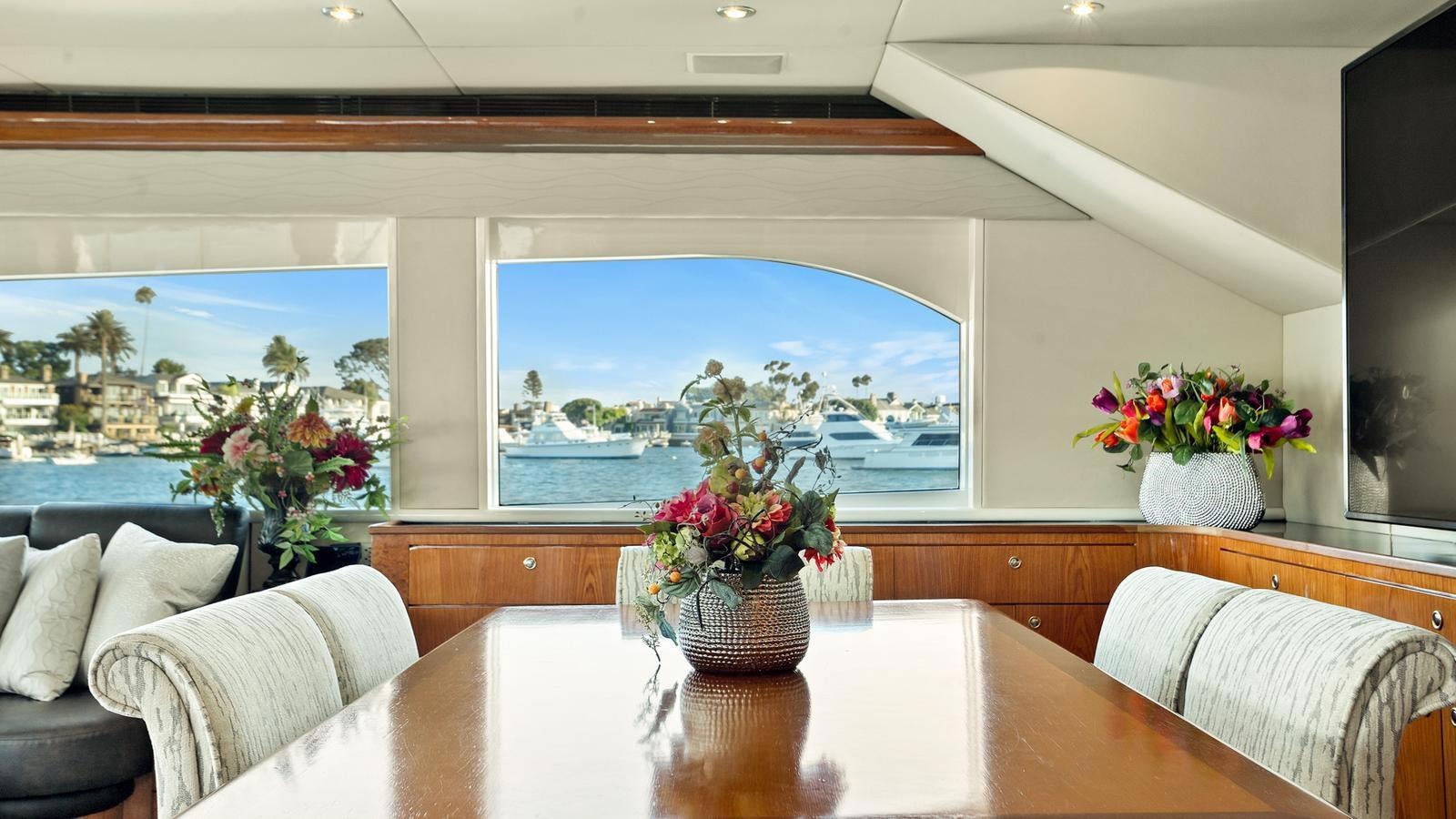 a table with a view of the ocean aboard ANGELICA Yacht for Sale