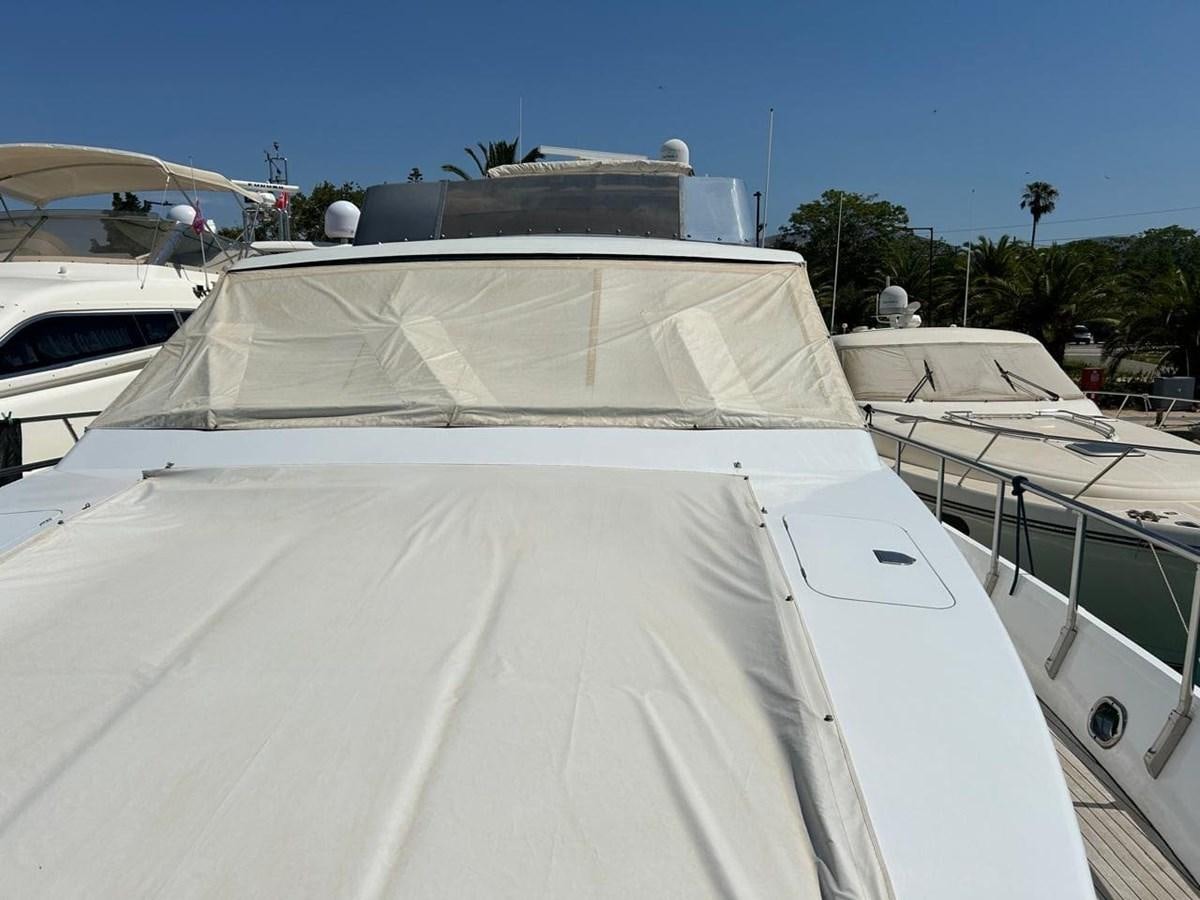 a group of boats parked in a harbor aboard MILMAR Yacht for Sale