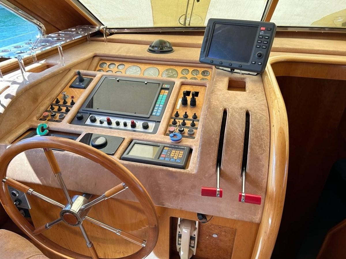 a wooden box with a radio and a fan aboard MILMAR Yacht for Sale