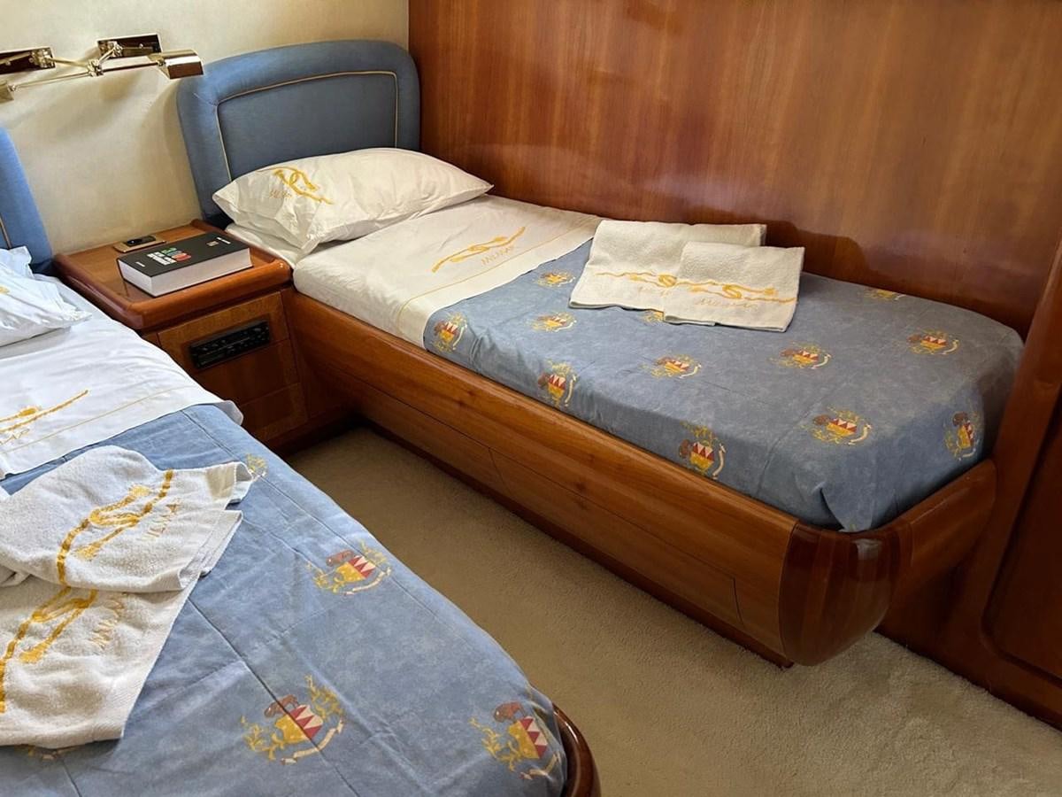 a couple of beds in a room aboard MILMAR Yacht for Sale