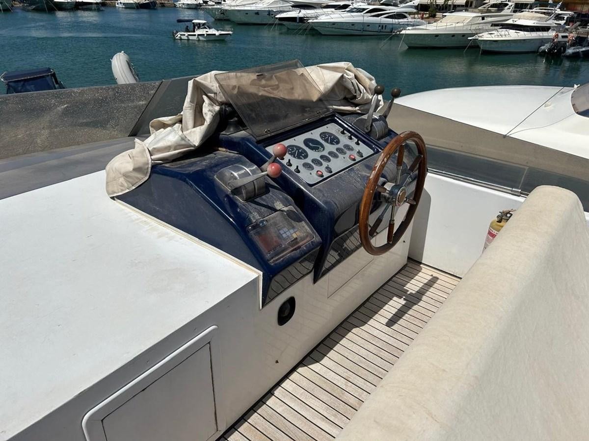 a car on a boat aboard MILMAR Yacht for Sale