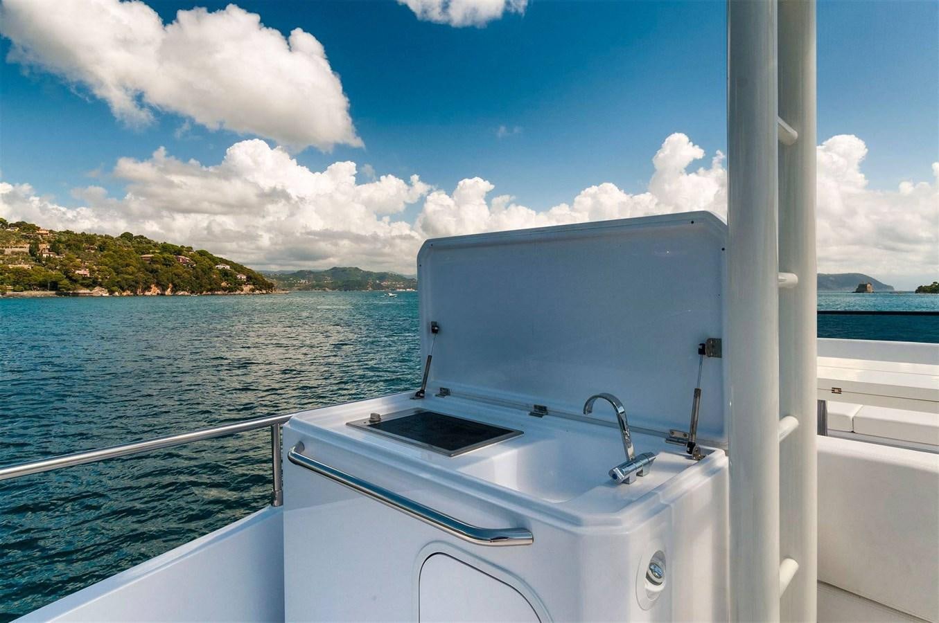 a boat on the water aboard SUNDECK YACHTS Yacht for Sale