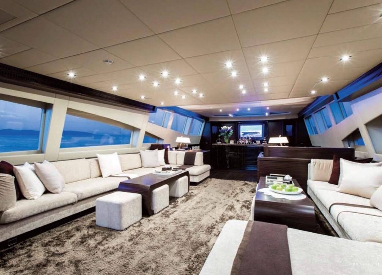 a living room with a large window aboard GENESIS Yacht for Sale