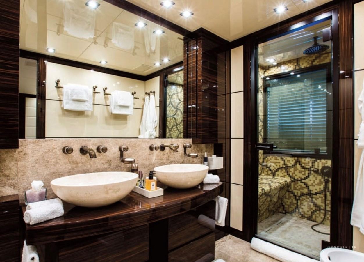 a bathroom with a large mirror aboard GENESIS Yacht for Sale