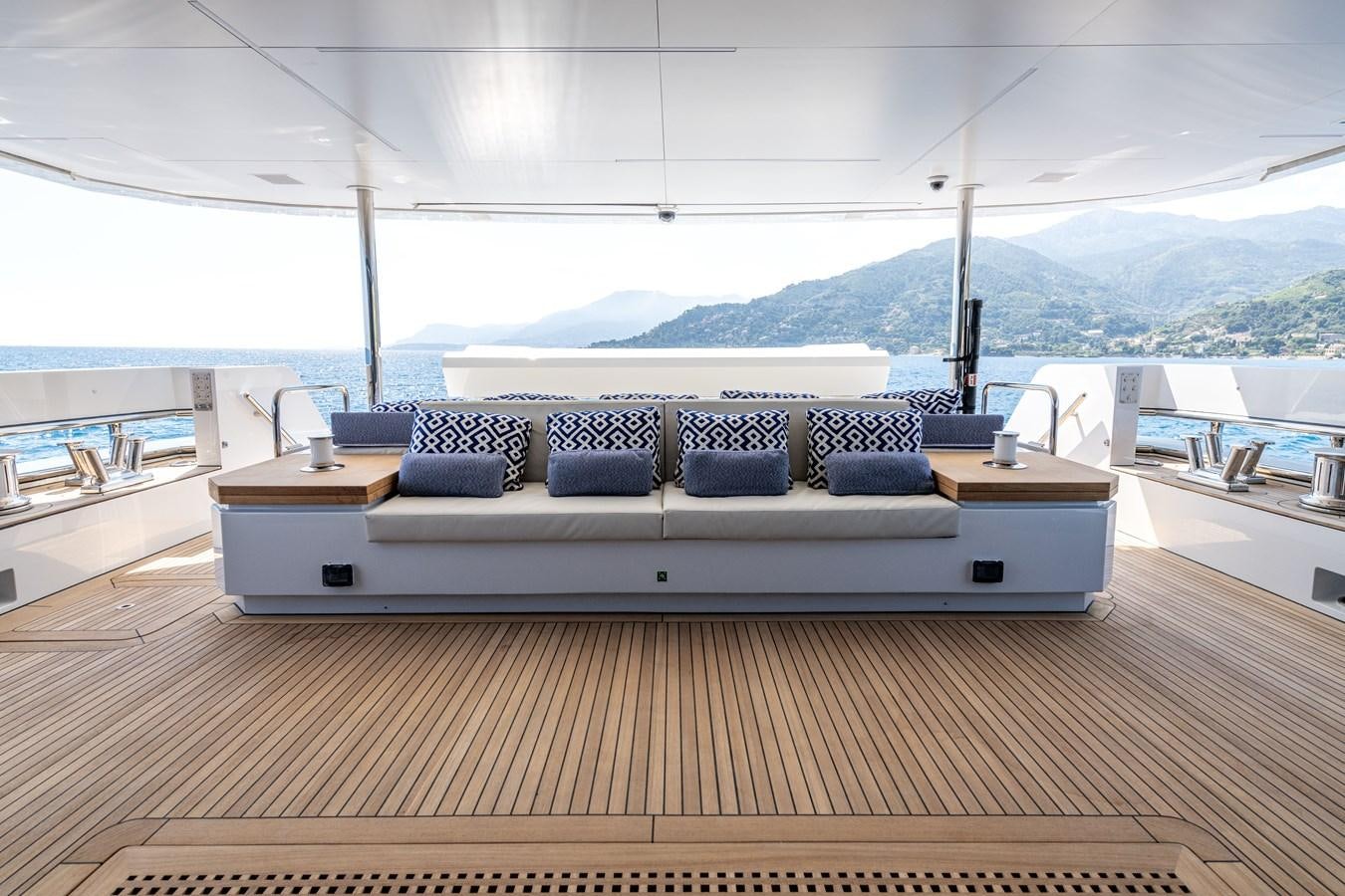 a couch in a room aboard RSY C.129 Yacht for Sale