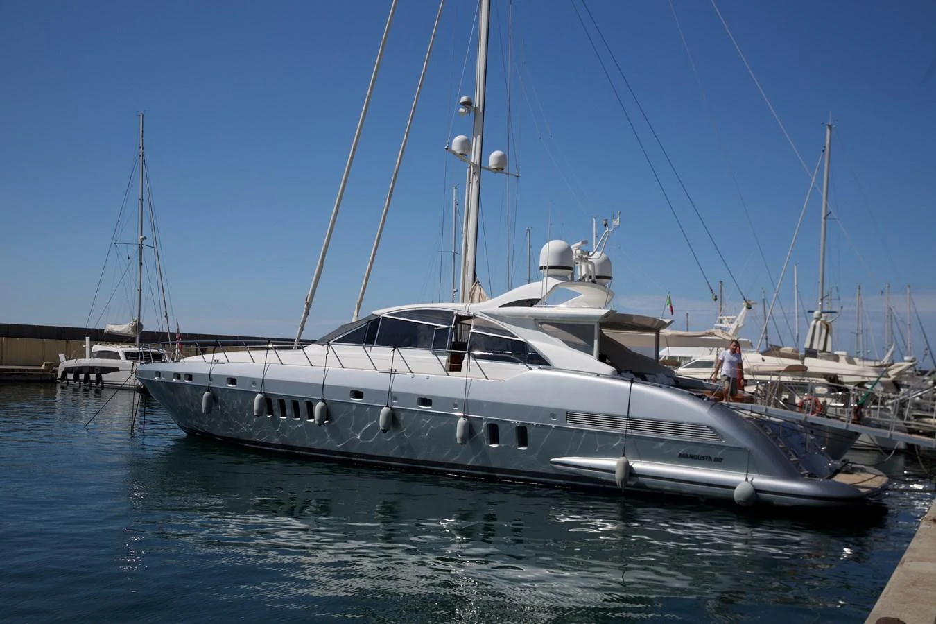 a boat docked at a pier aboard SILVER SKY Yacht for Sale