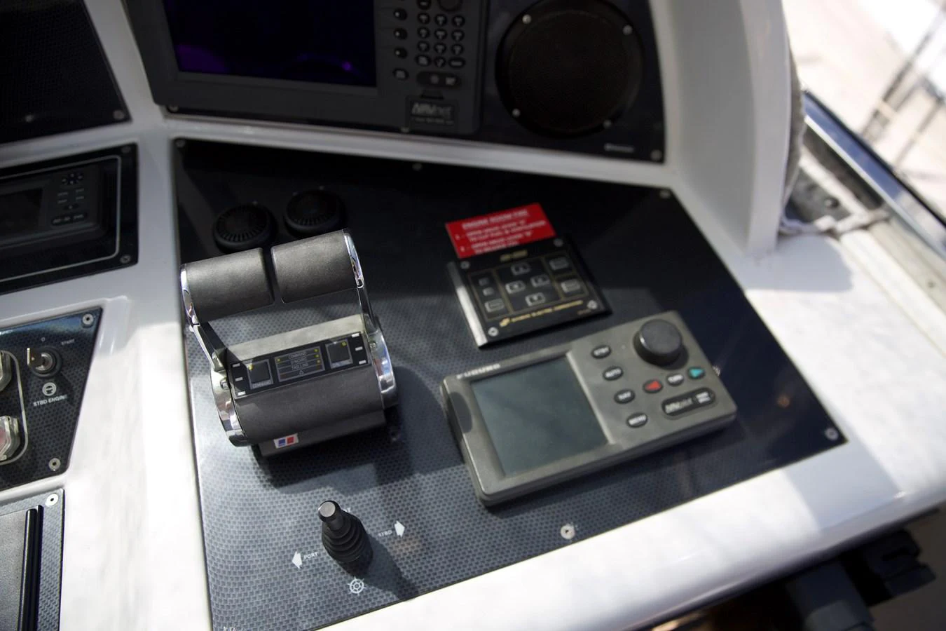 a group of electronic devices on a table aboard SILVER SKY Yacht for Sale
