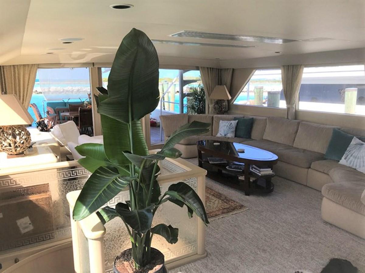 a room with a plant and a couch aboard MON SHERI Yacht for Sale
