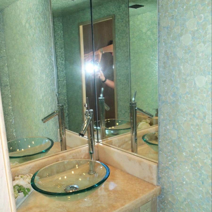 a bathroom with a large mirror aboard MON SHERI Yacht for Sale