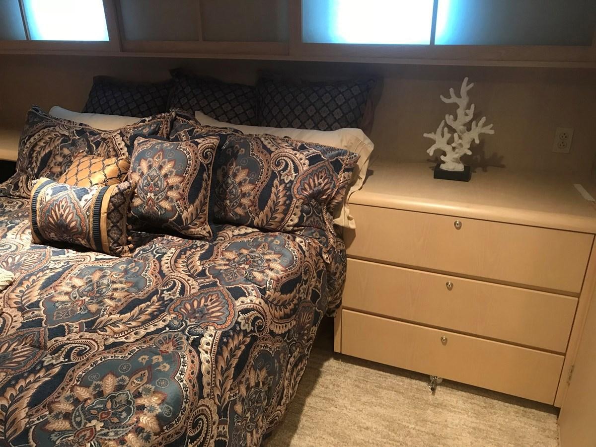 a couch with pillows aboard MON SHERI Yacht for Sale