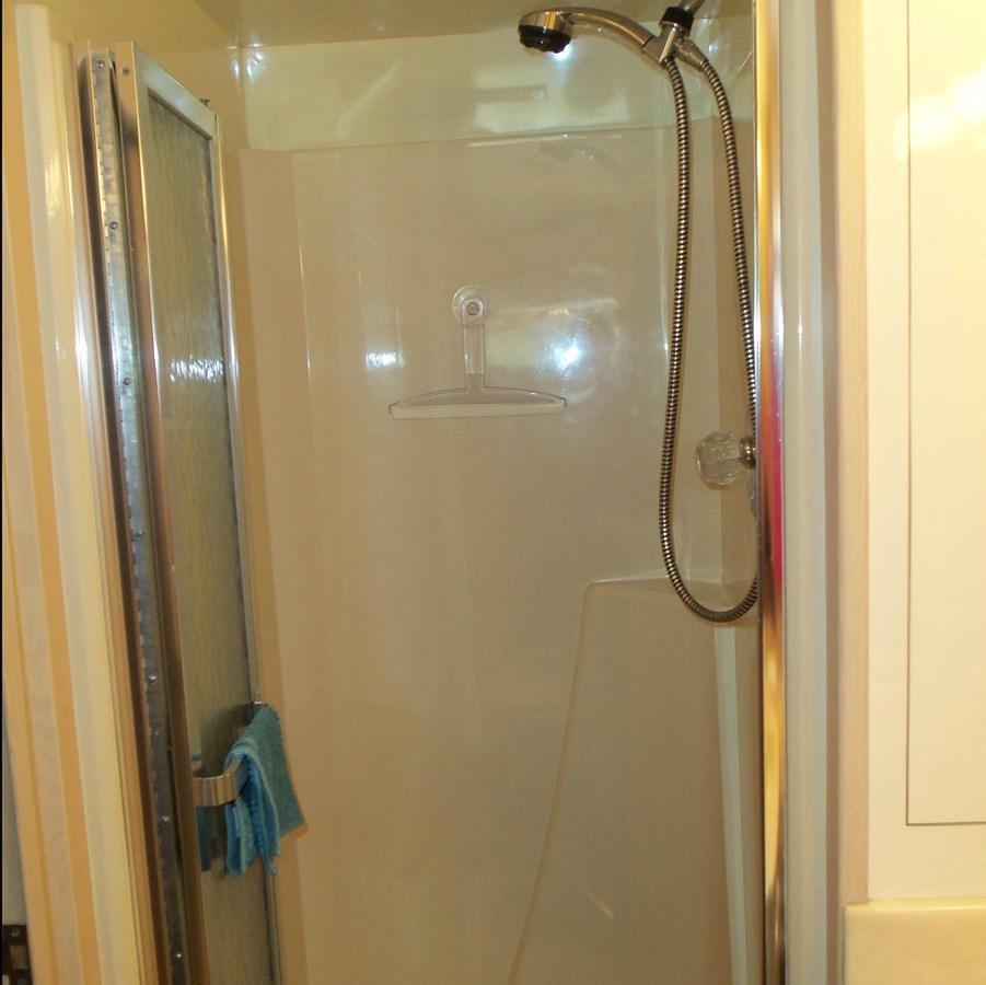 a shower with a glass door aboard MON SHERI Yacht for Sale