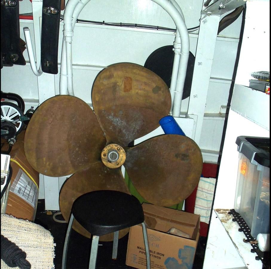 a large stack of logs in a room aboard MON SHERI Yacht for Sale