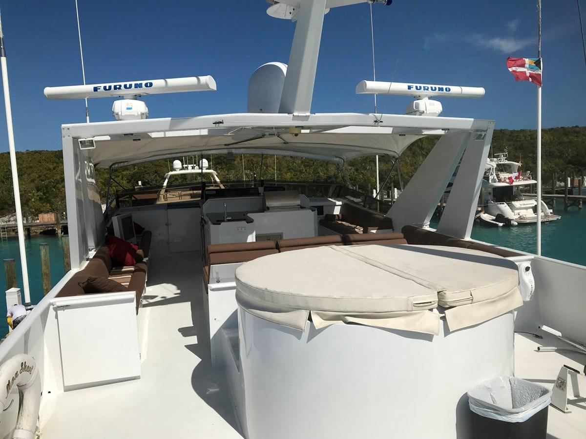 a boat on the water aboard MON SHERI Yacht for Sale