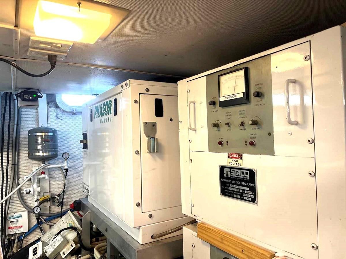 a large machine in a room aboard MON SHERI Yacht for Sale