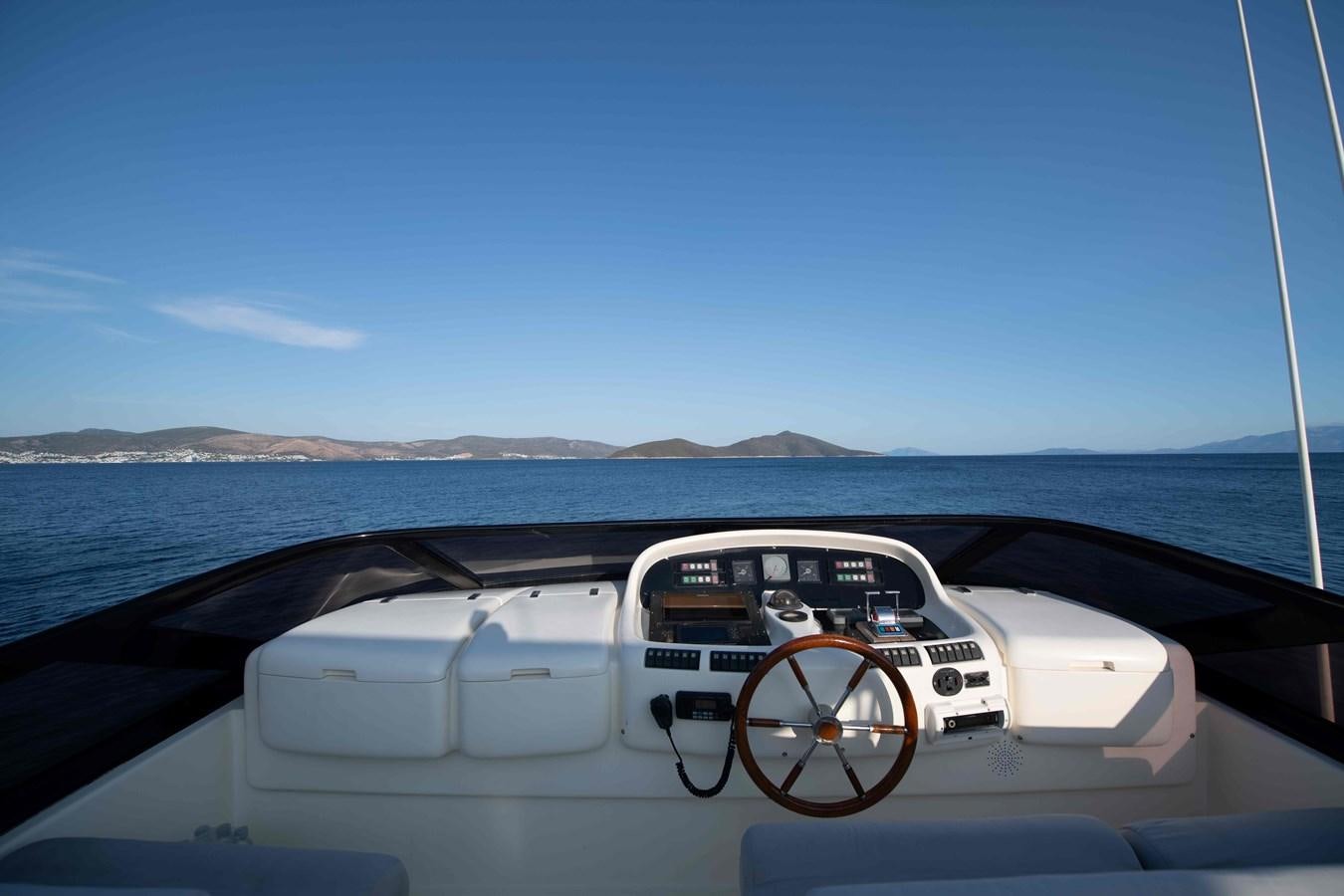 the front of a car on a boat aboard STOLI Yacht for Sale