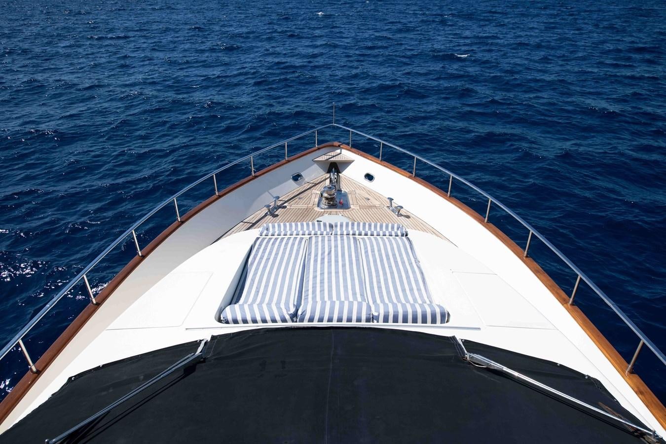 a boat on the water aboard STOLI Yacht for Sale