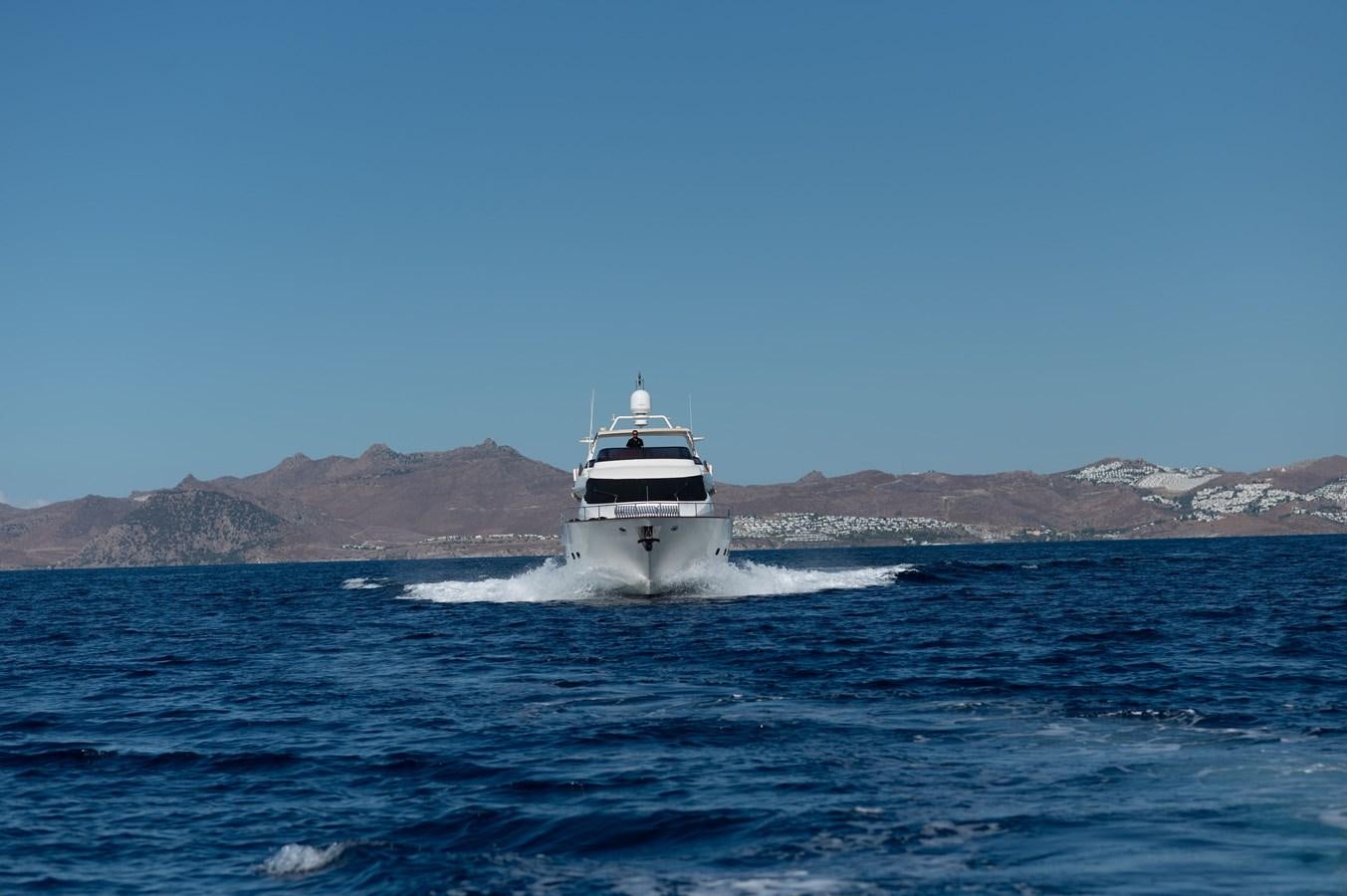 a boat on the water aboard STOLI Yacht for Sale
