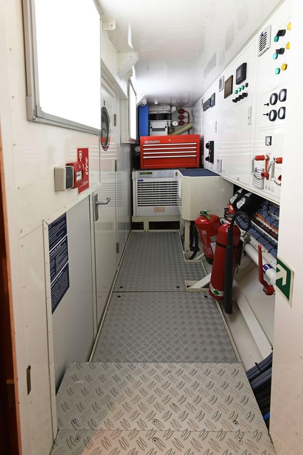a room with a machine aboard ATALANTE Yacht for Sale