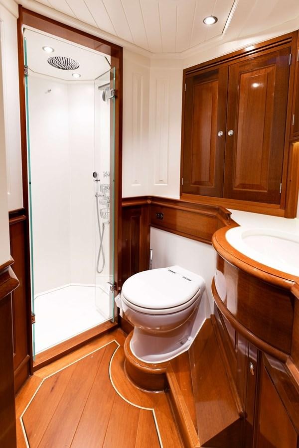 a bathroom with a sink toilet and a shower unit aboard ATALANTE Yacht for Sale
