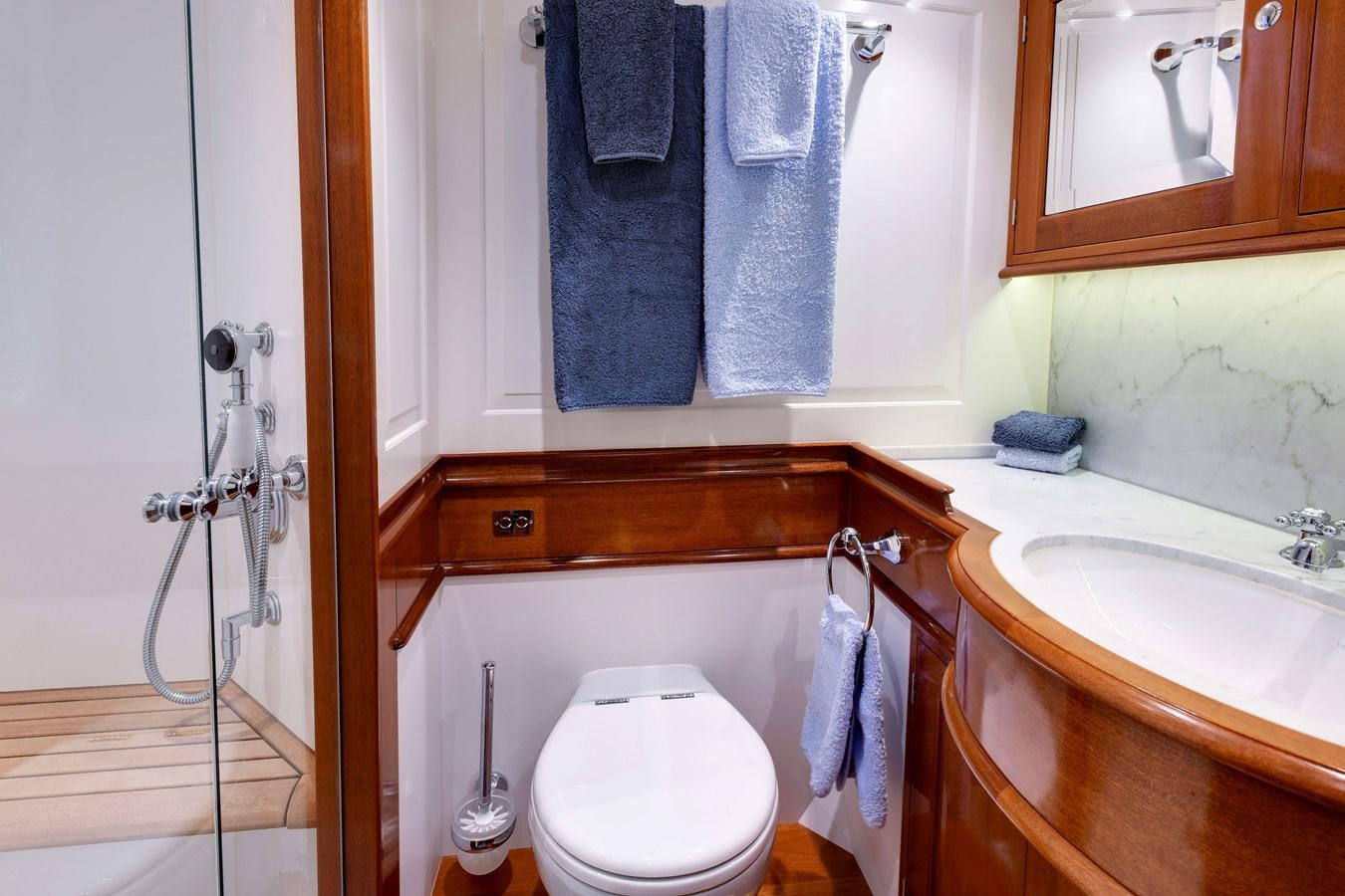a bathroom with a sink and toilet aboard ATALANTE Yacht for Sale