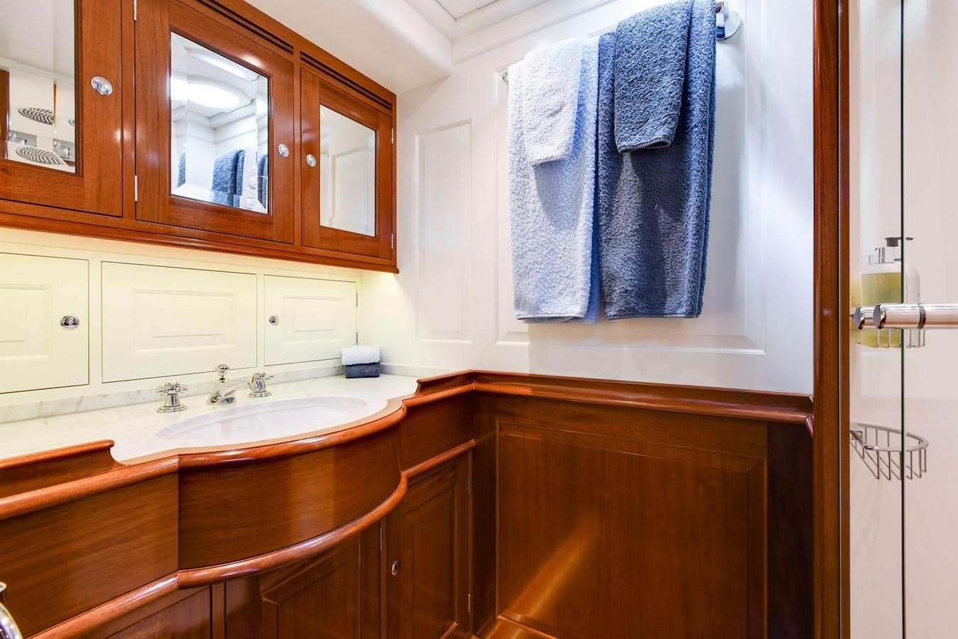 a bathroom with a towel on the wall aboard ATALANTE Yacht for Sale