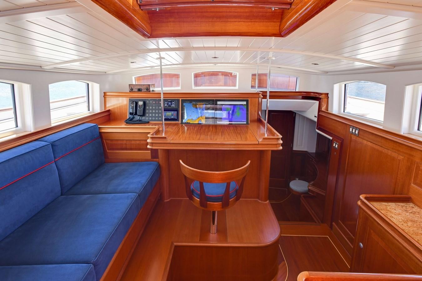 a room with a couch and a table aboard ATALANTE Yacht for Sale