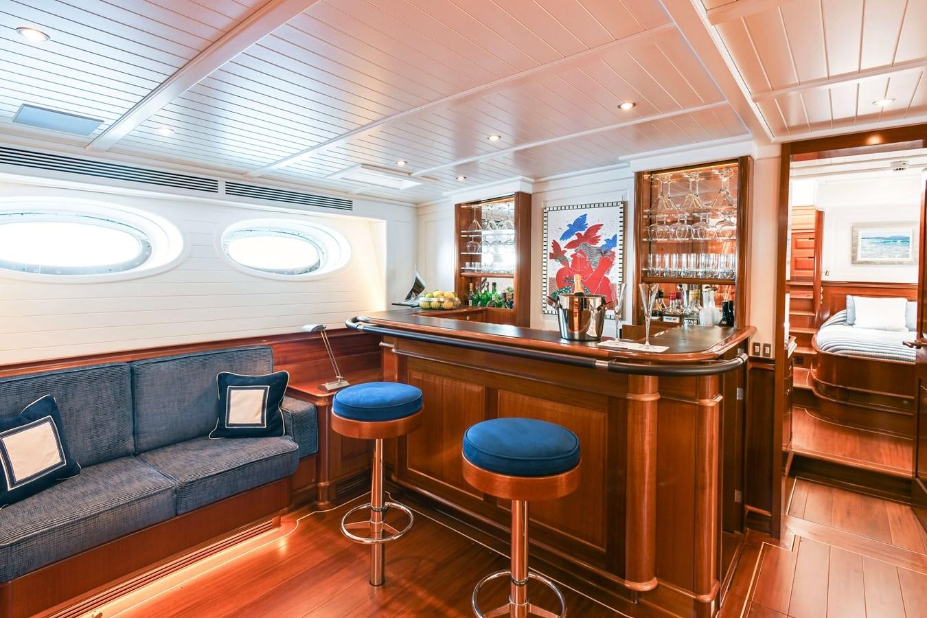 a kitchen with a couch and a table aboard ATALANTE Yacht for Sale